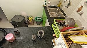 My girlfriend massaging her boobs with oil in the kitchen