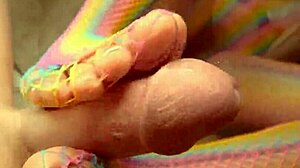 Latina milf gives footjob and plays with pussy.