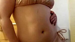 Petite amateur in pink bikini pov