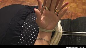 girl helplessly hogtied, palms exposed