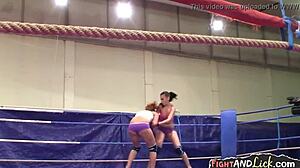 Wrestling lesbian babes size each other up in the ring