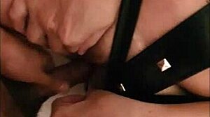 Wife in leather dress receives cumshot inside during kinky couple sex.