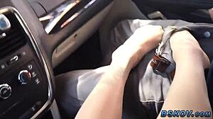 Milf gives public footjob in car