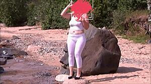 Is that girl with big ass in white leggings horny on the coast?