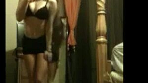 tori does an amateur striptease, peeling off her clothes slowly