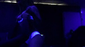 scarlett johnson under blacklight in suggestive sex scene