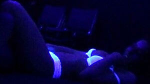 scarlett johnson under blacklight in suggestive sex scene