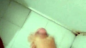 Detailed Bathroom Masturbation Leading to Intense Cumshot Explosion