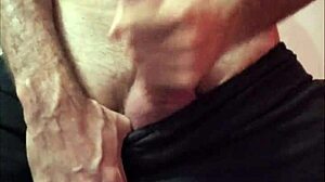 Enjoying a delicious handjob on a monster cock in this narrative scene