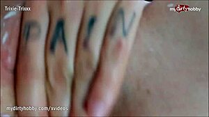 Busty tattooed chick gets oiled and plays with toys