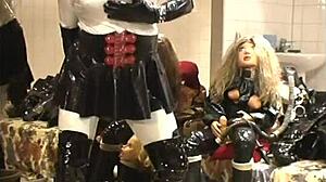 Ebony babe in rubber outfit performs show