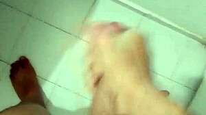 Detailed Bathroom Masturbation Leading to Intense Cumshot Explosion