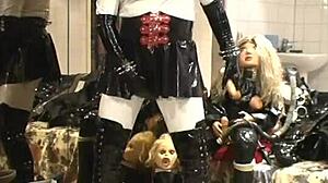 Ebony babe in rubber outfit performs show