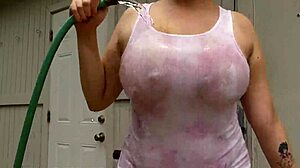 i wet my huge tits with neighbor's hose outside