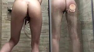 Two girlfriends enjoy a playful shower session with toys
