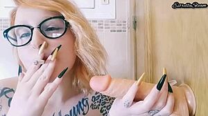 Boldly smoking cigarette on dildo fetish