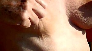 K and her natural tits in the calm morning nature setting.