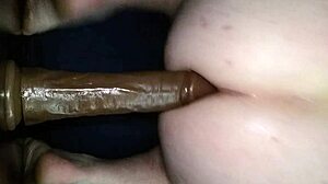 guy bends over for dildo doggy style fucking