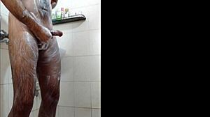 Guy feels intense pleasure masturbating in shower, reaching orgasm