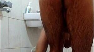Guy feels intense pleasure masturbating in shower, reaching orgasm