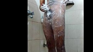 Guy feels intense pleasure masturbating in shower, reaching orgasm