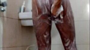 Guy feels intense pleasure masturbating in shower, reaching orgasm