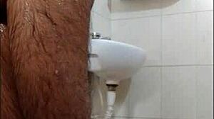 Guy feels intense pleasure masturbating in shower, reaching orgasm