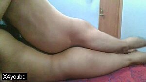 Deshi couple enjoys intimate moments with partner.