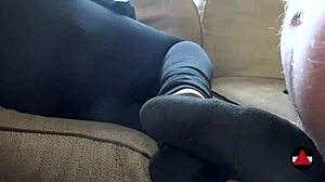 Asian Friend Gives Footjob in Boots, Leading to Cumshot on Leggings.