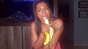 Topless Desi Squeezes Boobs While Sucking and Deepthroating Banana Kinkily