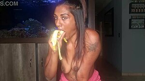 Topless Desi Squeezes Boobs While Sucking and Deepthroating Banana Kinkily