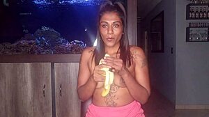 Topless Desi Squeezes Boobs While Sucking and Deepthroating Banana Kinkily