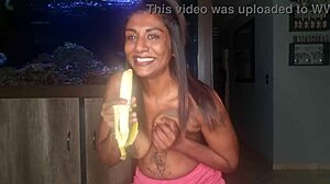 Topless Desi Squeezes Boobs While Sucking and Deepthroating Banana Kinkily
