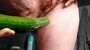 granny drills hairy slit with cucumber