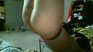 Hanging upside down, wrists tied in bdsm