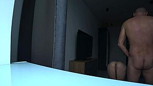 The wife cheats while her husband is at work, fucking the neighbor on their bed.