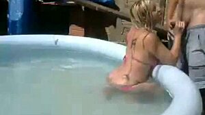 blonde performs on webcam in favela setting
