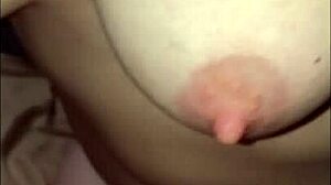 Lesbian amateurs tribbing hard with loud moans.