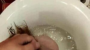 I love seeing that masked brunette gag on cock in the bathroom doggystyle before the cumshot