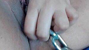 Teen 18+ Engages in BDSM Masturbation Using a Chain