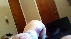 Hey, watch this tattooed wife licking ass and giving blowjob to monster cock