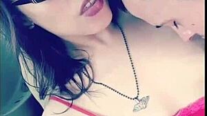 In the garage, a sexy couple engages in outdoor titty licking with glasses on, sucking and licking boobs topless