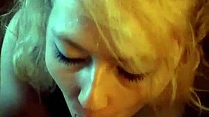 a busty blonde girlfriend films homemade videos with her friend, showcasing big tits and ass in amateur couple compilations.