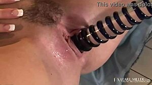 High-heeled Riley Shy slams glass dildo deep inside!