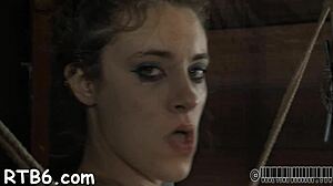 Petite slut undresses in cage intensely