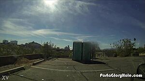 on a hiking trail, she swallows cum through a porta potty gloryhole