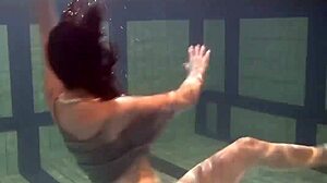 katya okuneva bounces in dress by pool