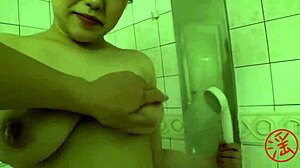 japanese babe blows shaved pussy in bathroom