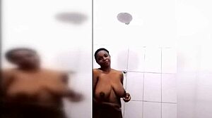 Huge-Titted Black Cutie Showers, Revealing Natural Tits