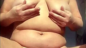 Exploring my body with oil, expanding in private for intimate connection.